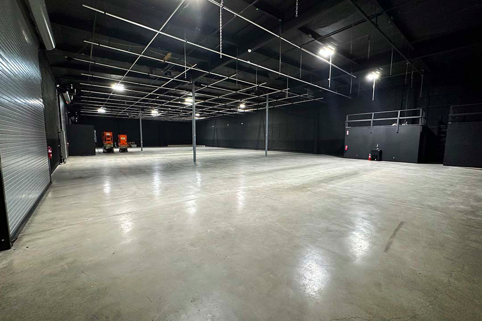 Stage 1 - 10,000 SF open soundstage with 17 ft to the grid and 3-phase power. Flexible layout ideal for film, television, and commercial production.